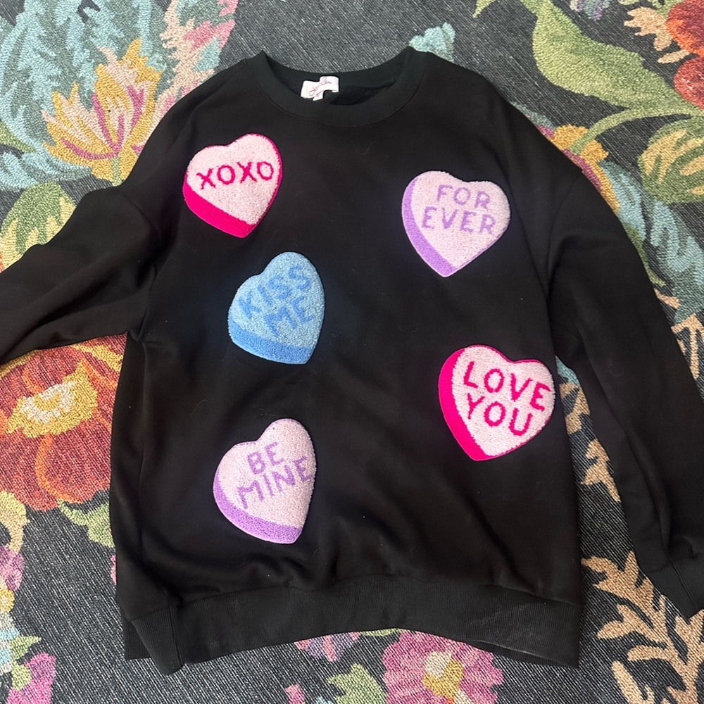 Chic Black Sweatshirt with Colorful Heart Patches